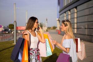 two girls shopping